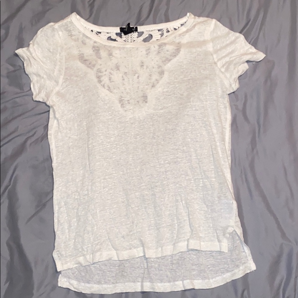 White tee with design on the back